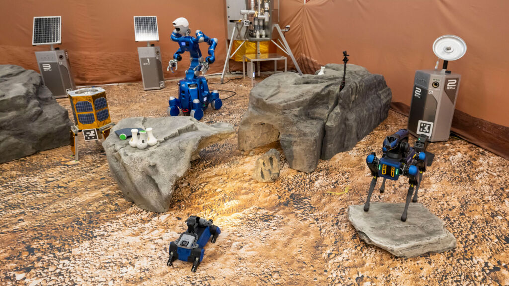 Robotersteuerung aus dem Weltall 1 Das Roboterteam des Projekts Surface Avatar.